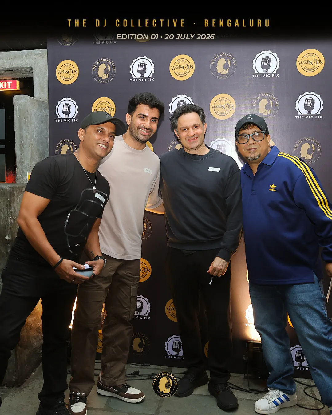 Four DJs lined up for a portrait, name badges on
