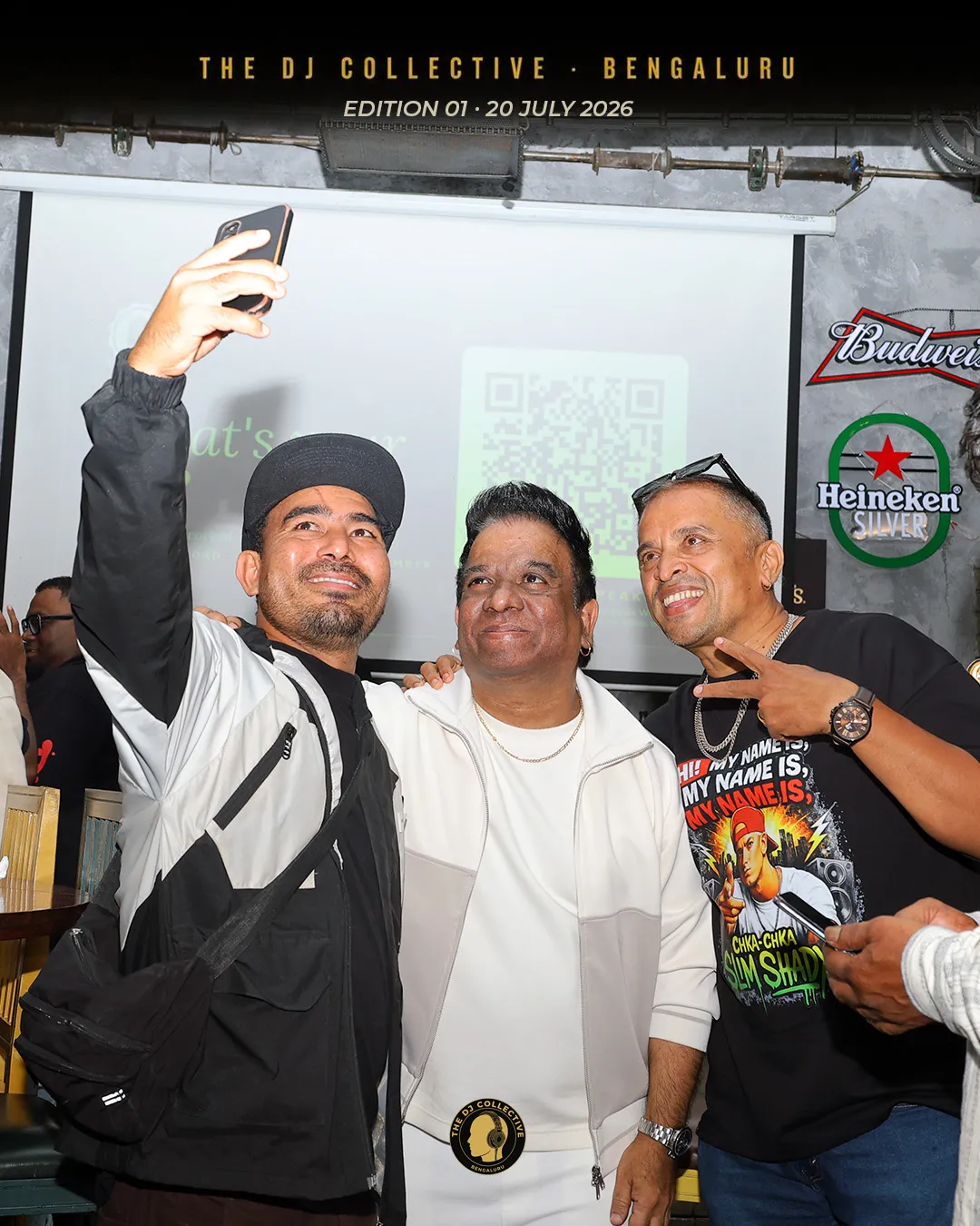 Three people crowding into a phone camera for a selfie